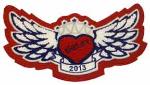 This is a winged heart patch with an embroidered crown.  Used on the back or front of a varsity letterman jacket