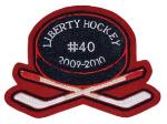 This is a sleeve crossed hockey sticks patch.  This looks great on your varsity letterman jacket.